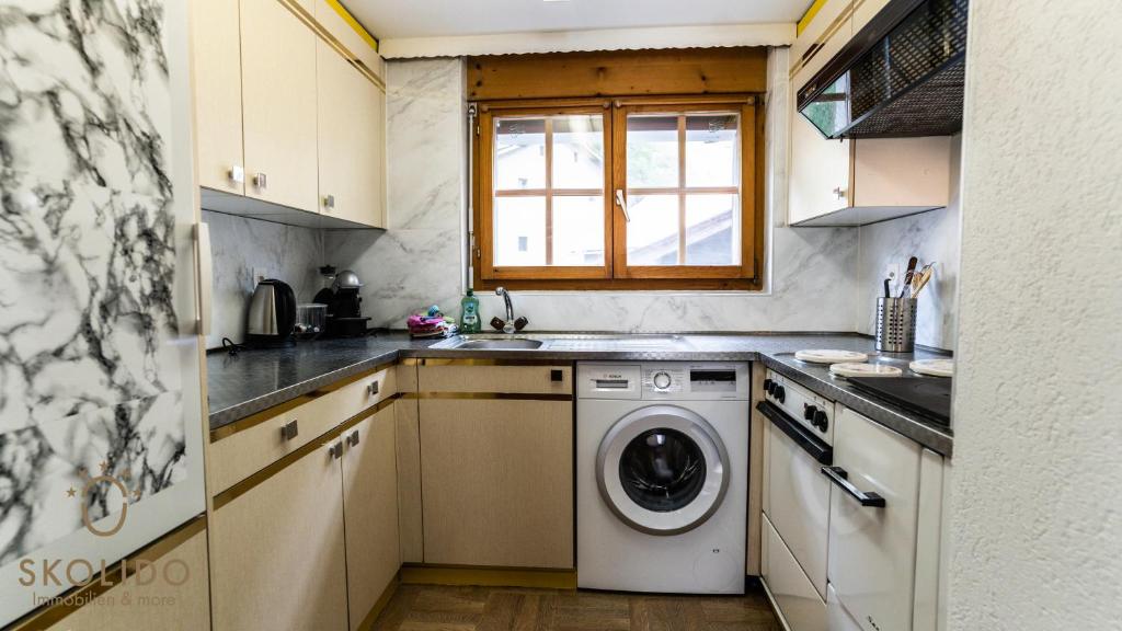Kuchyň nebo kuchyňský kout v ubytování Gemütliches Ferienhaus Brigerbad