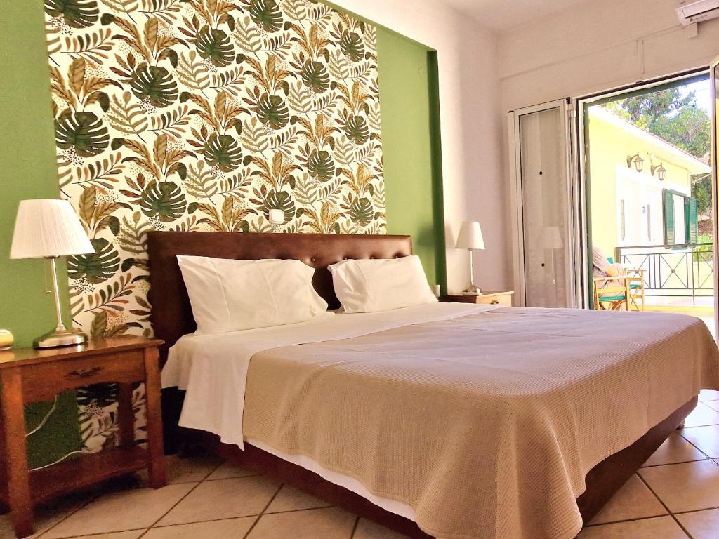 Posteľ alebo postele v izbe v ubytovaní Panorama Apartments Fiscardo
