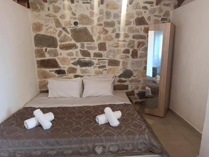 Postel nebo postele na pokoji v ubytování Mountain House Paliouras