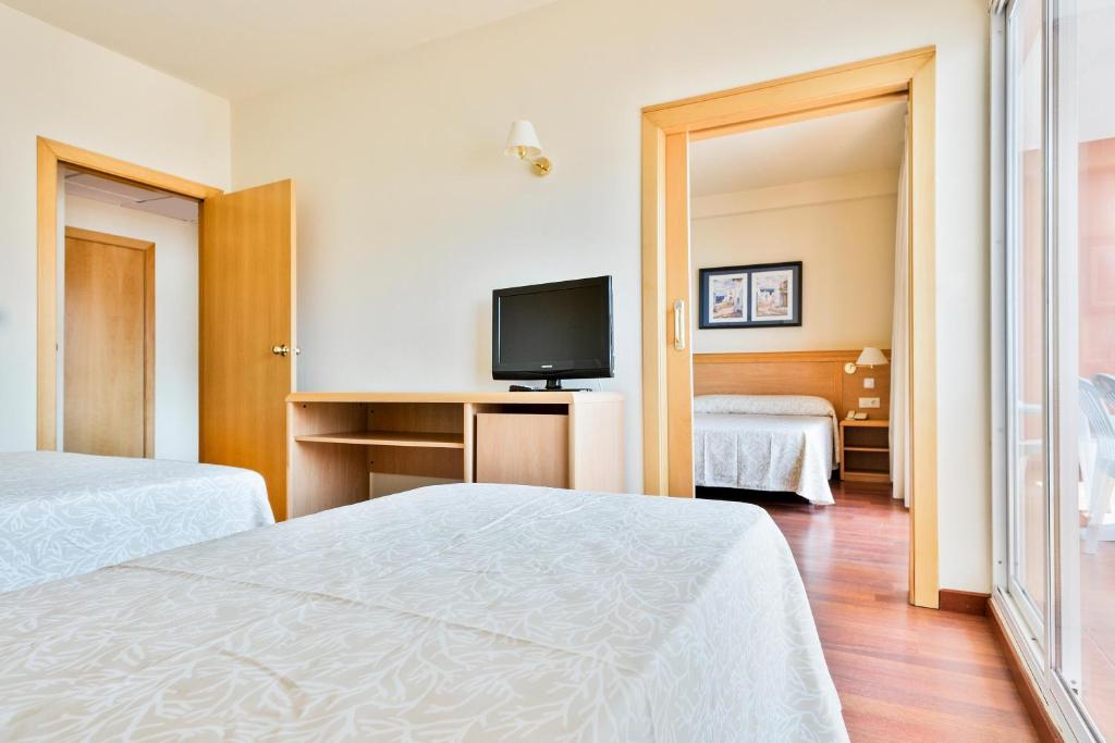 Postel nebo postele na pokoji v ubytování Hotel Best Mojácar