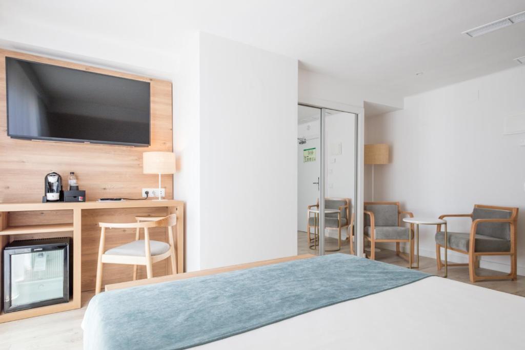 TV a/nebo společenská místnost v ubytování Hotel Best Terramarina