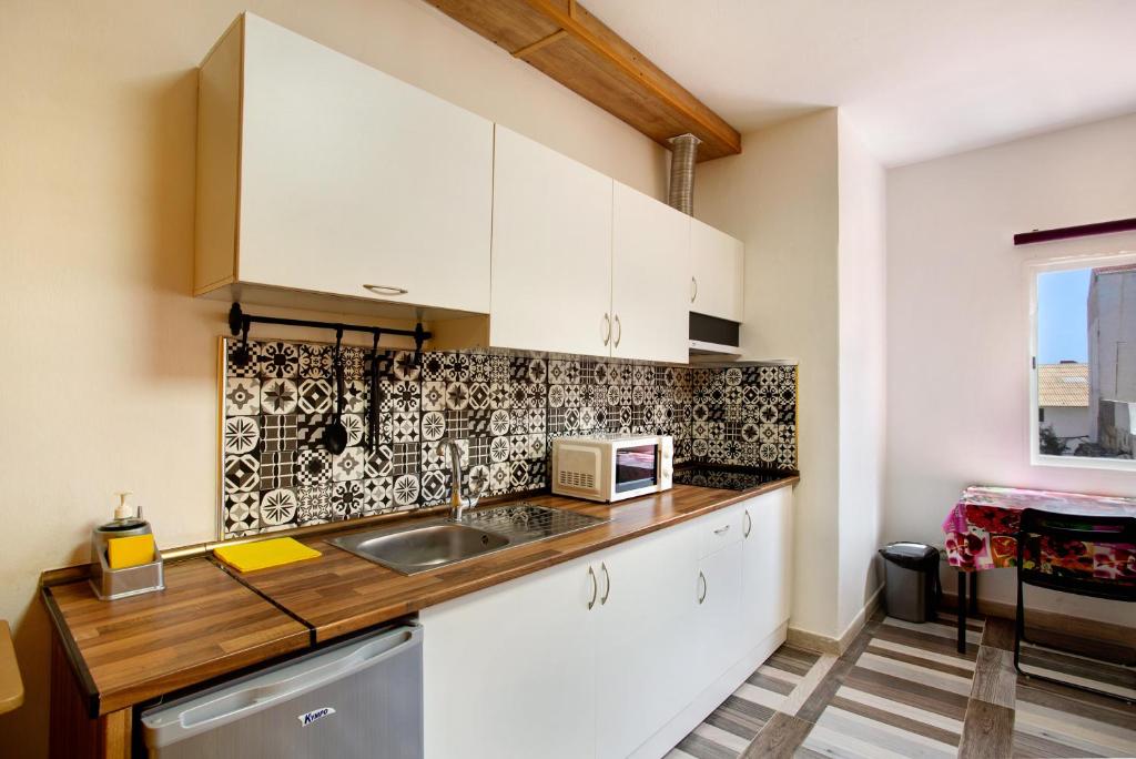Kuchyň nebo kuchyňský kout v ubytování Apartamento C para 2 en Vecindario