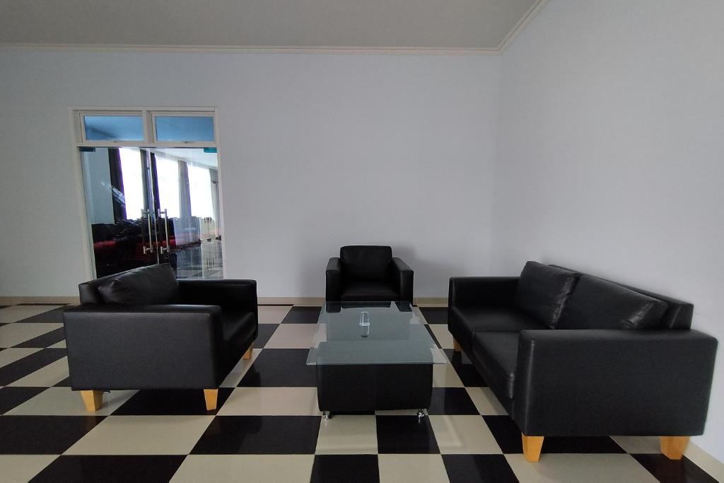 Posezení v ubytování Hotel Sutha Inn Syariah