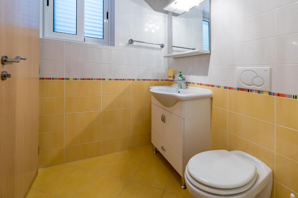 Koupelna v ubytování Apartments Nadica