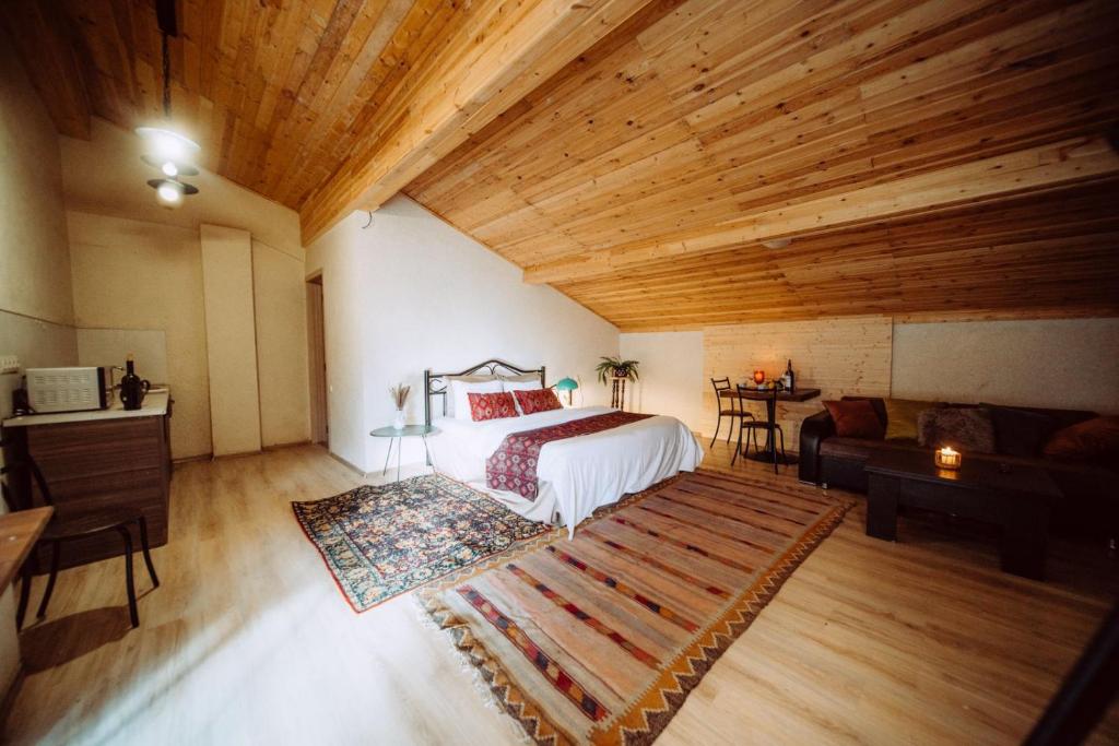 Кровать или кровати в номере Chalet Papa Basili