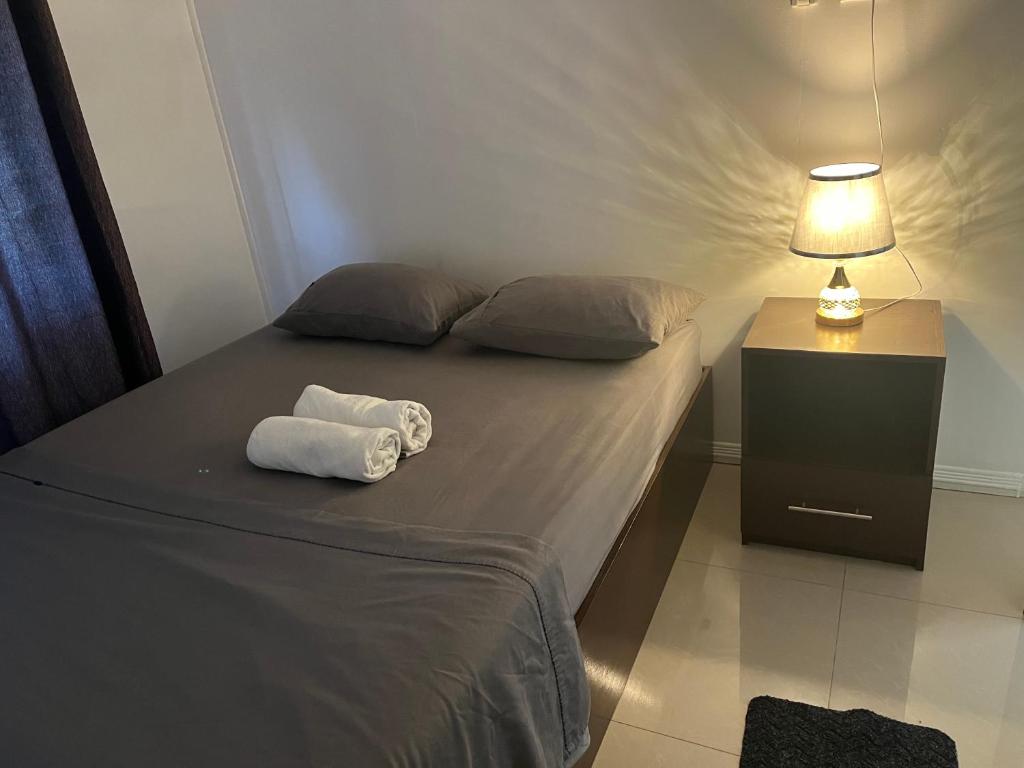Postel nebo postele na pokoji v ubytování Bula Homestay