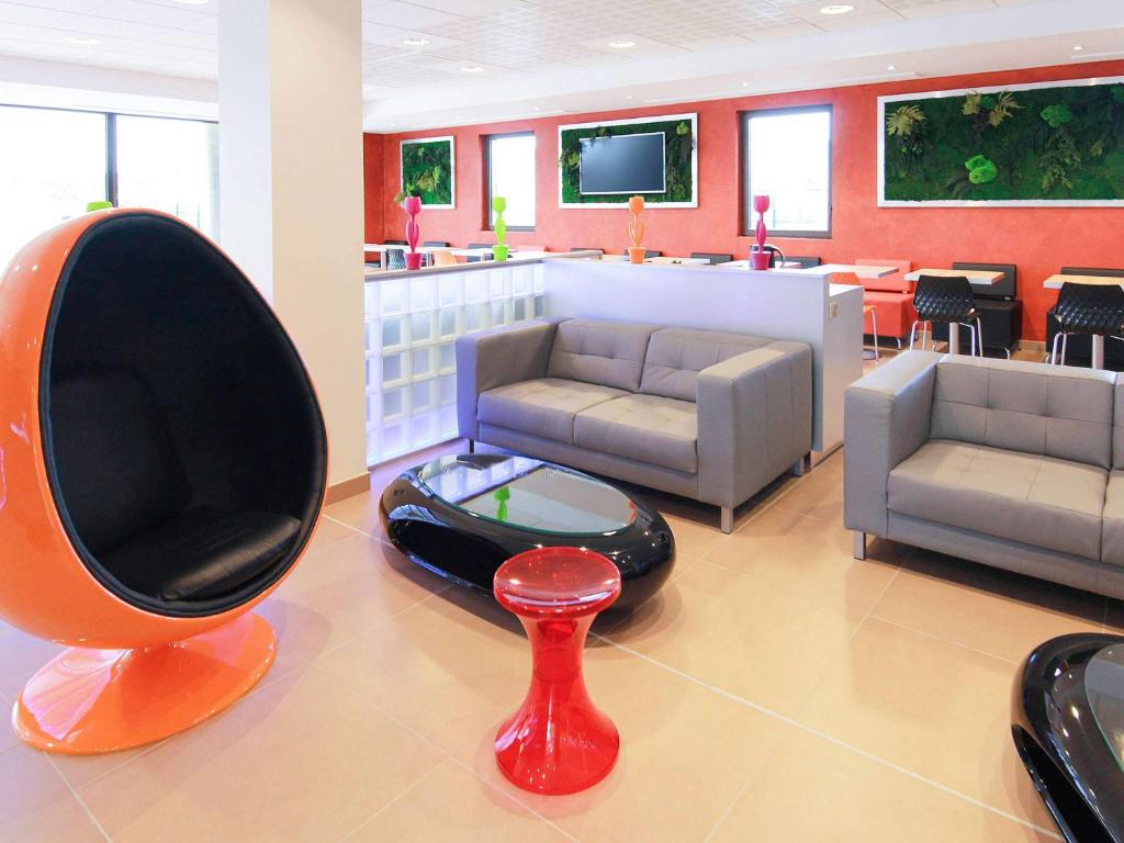 Posezení v ubytování ibis Styles Flers