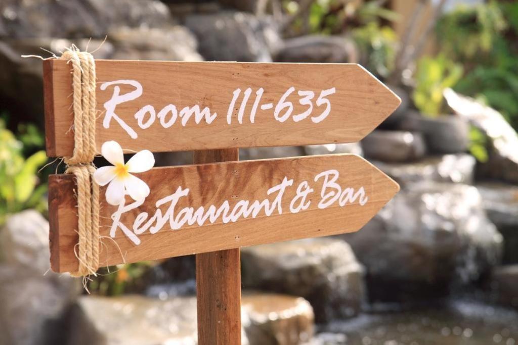 a wooden sign that says room lift restaurant and bar at Deva Beach Resort Samui in Choeng Mon Beach