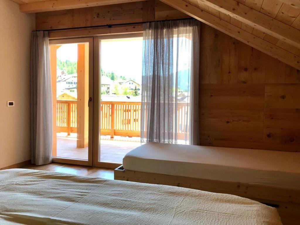 Postel nebo postele na pokoji v ubytování Apartments Chalet Maria