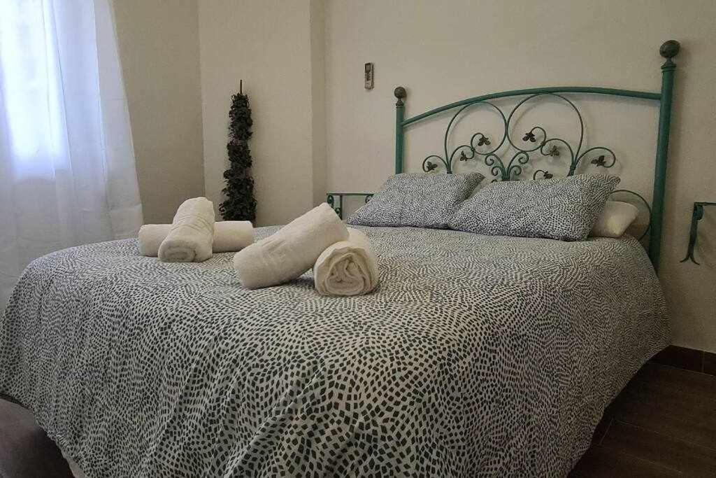 Postel nebo postele na pokoji v ubytování Ático Reig frente al mar