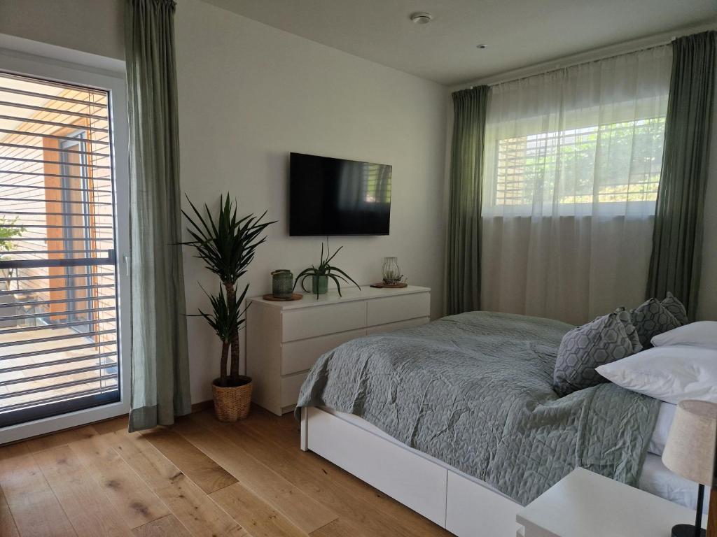 Postel nebo postele na pokoji v ubytování Traumhaus in den Weinbergen - max 8 Personen - mit Self-Check-in