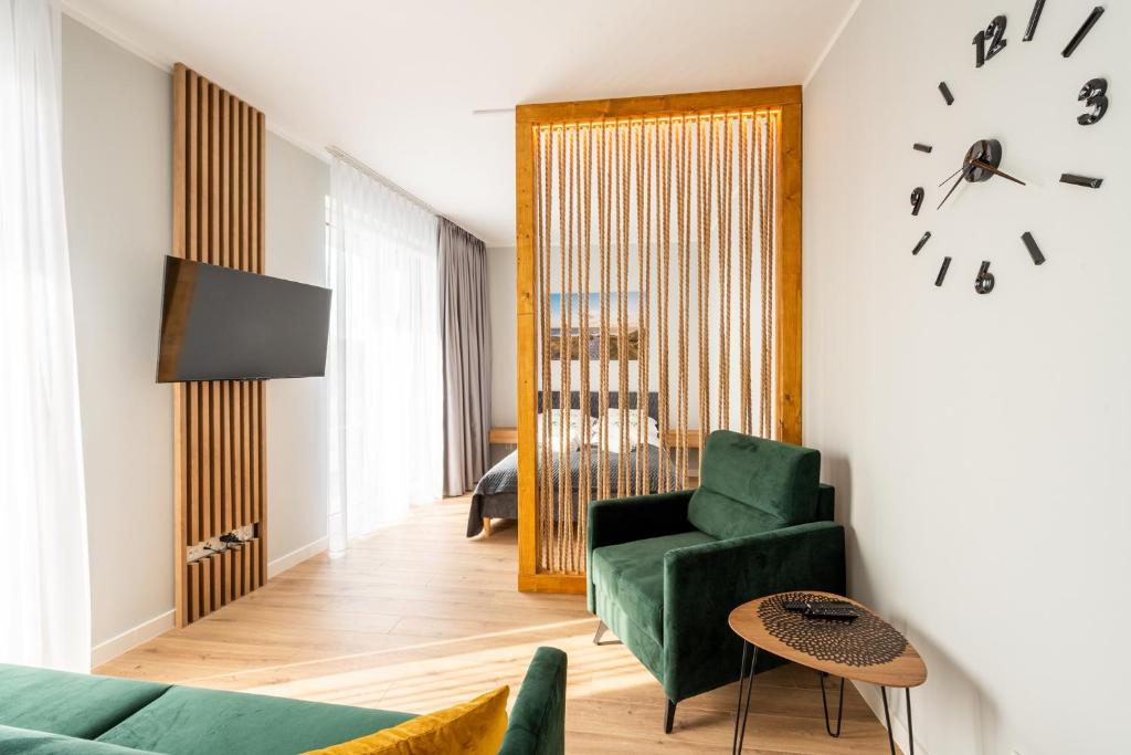 TV/trung tâm giải trí tại Horyzont Apartamenty- Studio- SAUNA&FITNESS -BAŁTYCKA 2- ŚNIADANIA