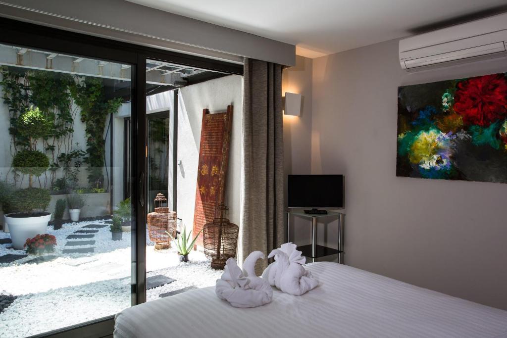 Postel nebo postele na pokoji v ubytování Be Loft B&B Pool & Spa