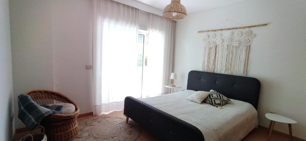 Postel nebo postele na pokoji v ubytování Figueira Holidays