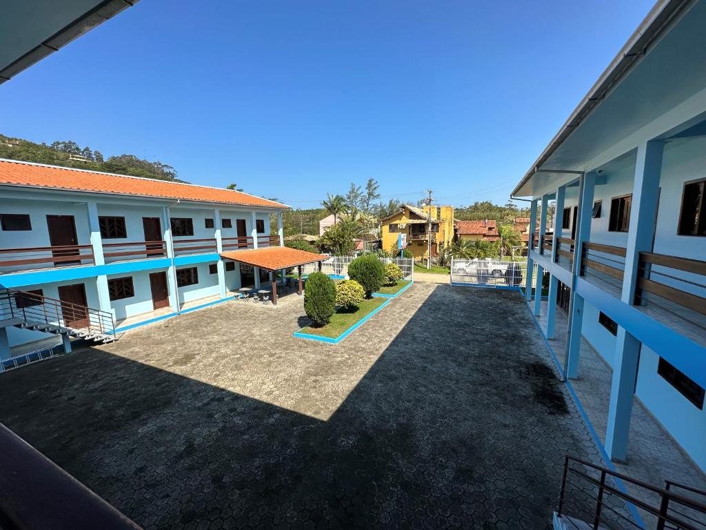 a view of the courtyard of a school building at POUSADA SOLAR DE ANITA in Garopaba