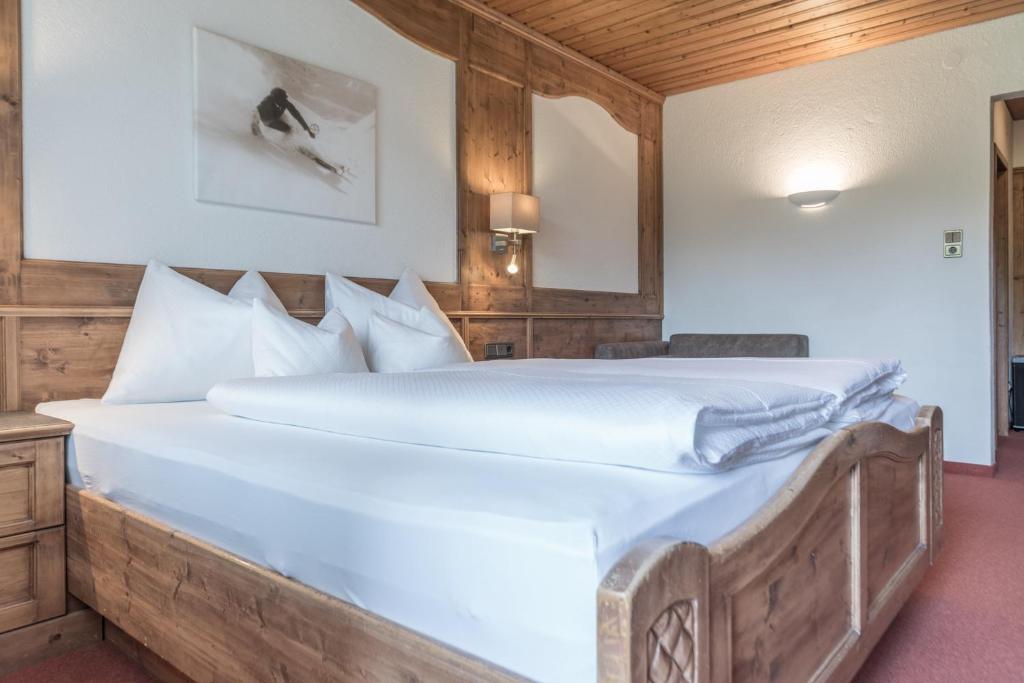 Postel nebo postele na pokoji v ubytování Pension Bergfrieden