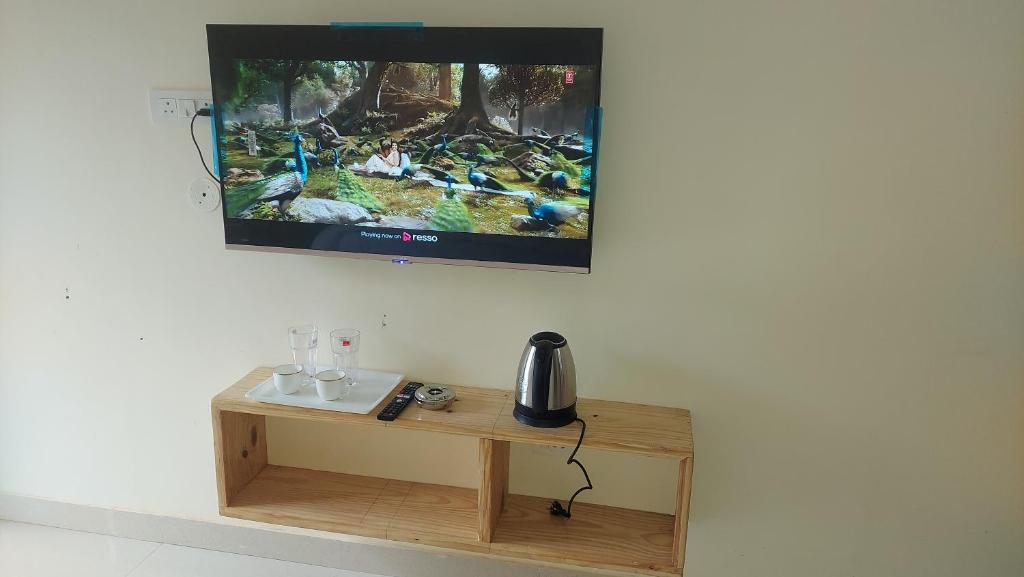 Příslušenství pro přípravu čaje a kávy v ubytování Hotel Anandam phata
