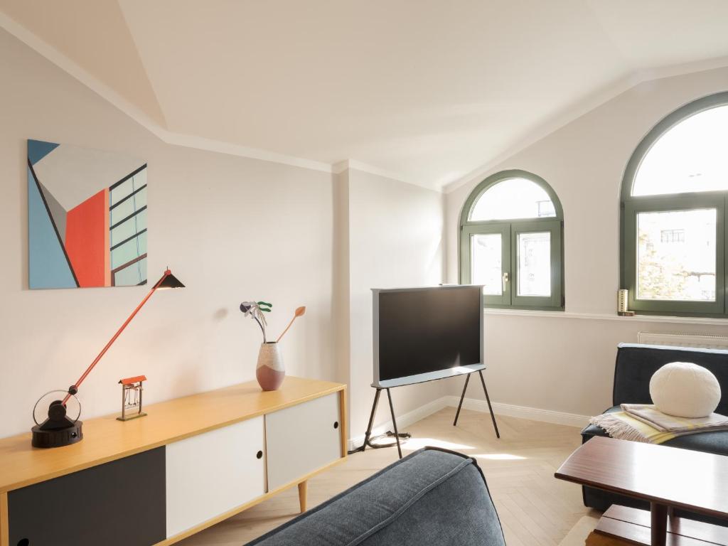 TV a/nebo společenská místnost v ubytování OSTKÜSTE - Villa Steigel Design Apartments