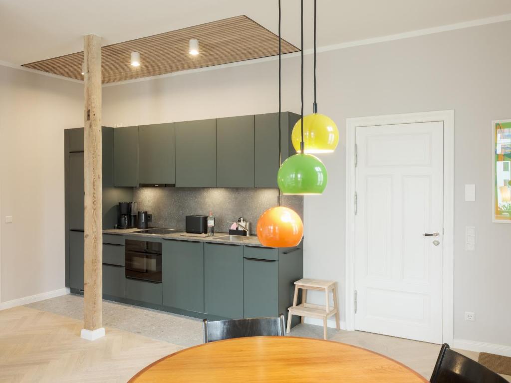 Kuchyň nebo kuchyňský kout v ubytování OSTKÜSTE - Villa Steigel Design Apartments