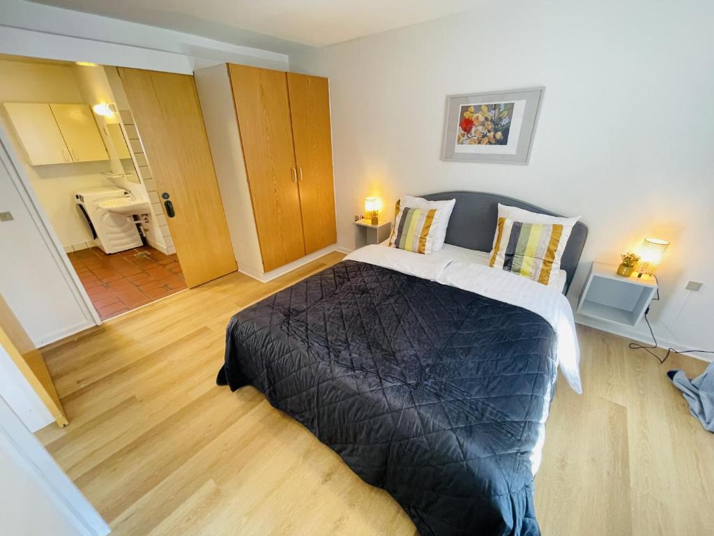 Postel nebo postele na pokoji v ubytování aday - Central Terrace Apartment in Hjorring