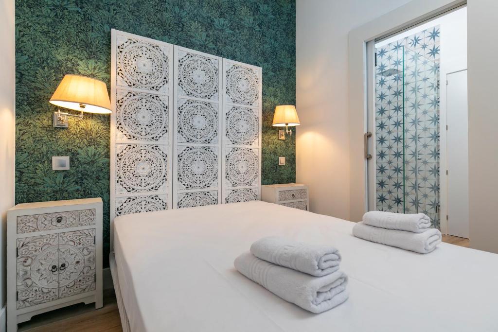 Postel nebo postele na pokoji v ubytování PLAZA DE CASTILLA Apartments