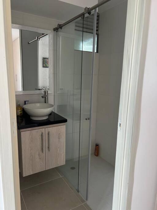 Koupelna v ubytování Tiziano apartamento 504