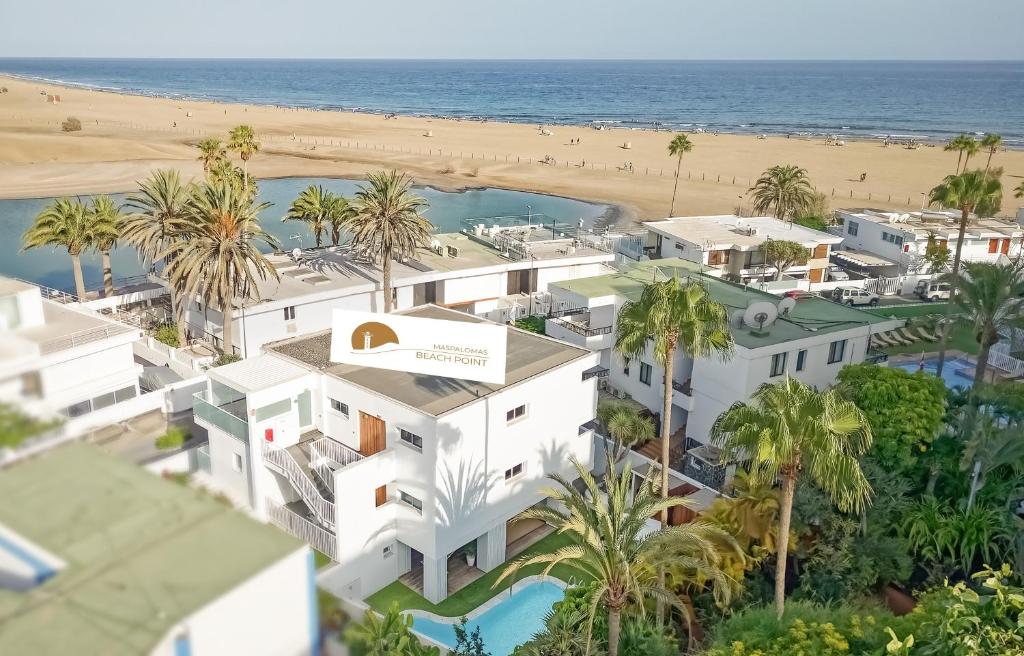 an aerial view of a hotel and the beach at Maspalomas Beach Point in San Bartolomé de Tirajana