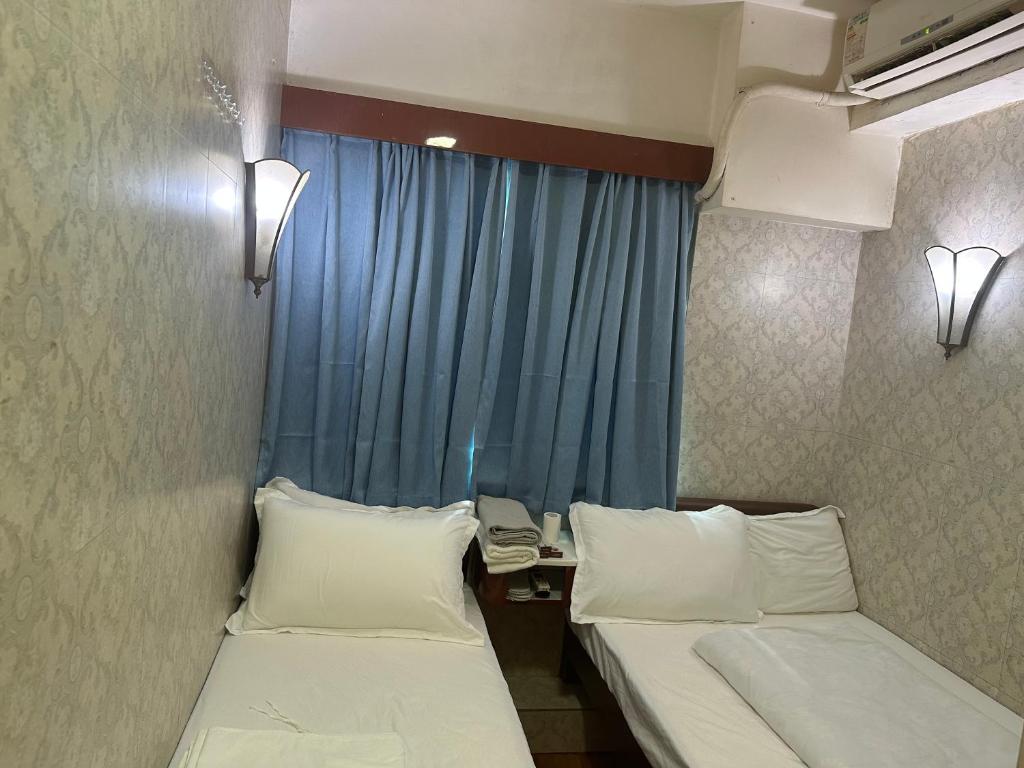 Postel nebo postele na pokoji v ubytování Piaget guest house