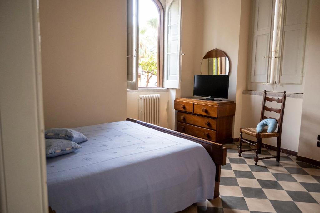 Łóżko lub łóżka w pokoju w obiekcie Villa Giada