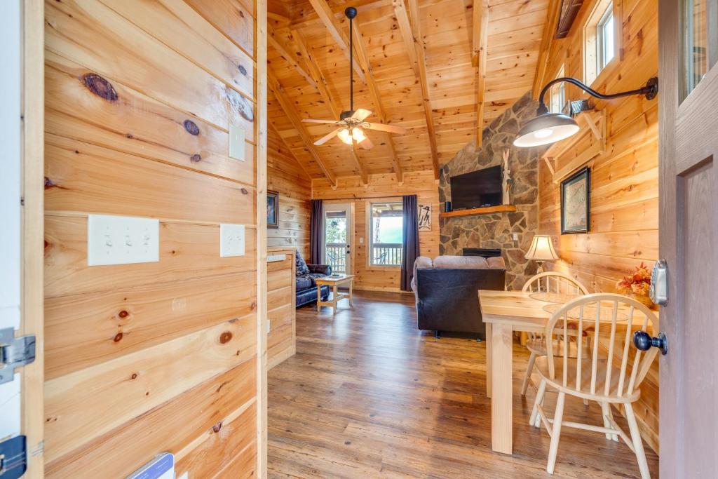 a dining room and living room in a tiny house at Always in Gatlinburg