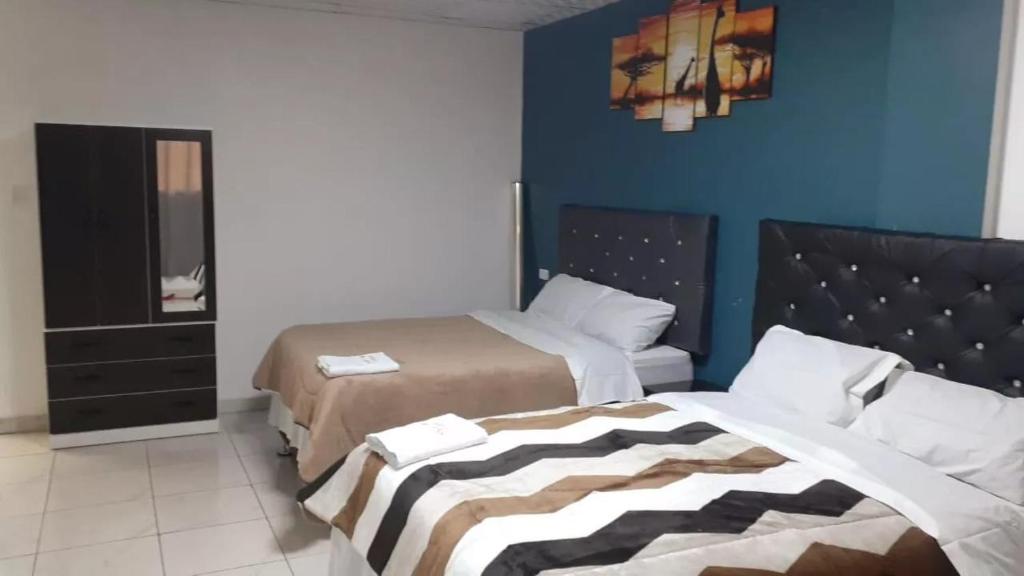 Postel nebo postele na pokoji v ubytování HOSPEDAJE BLESS