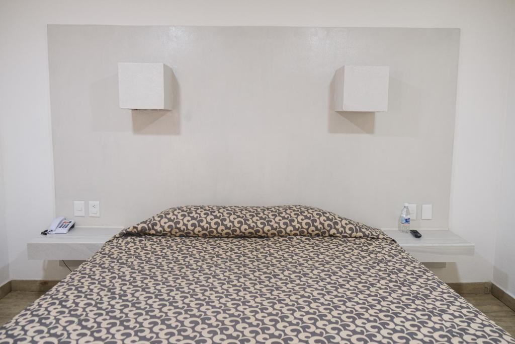 Postel nebo postele na pokoji v ubytování Hotel St. George