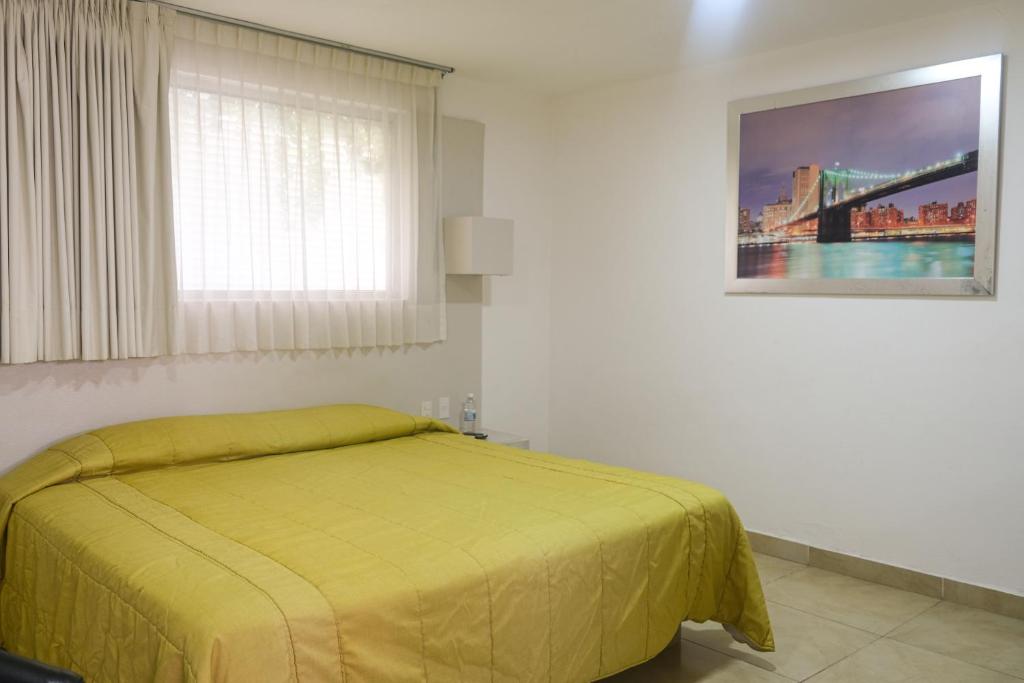 Postel nebo postele na pokoji v ubytování Hotel St. George