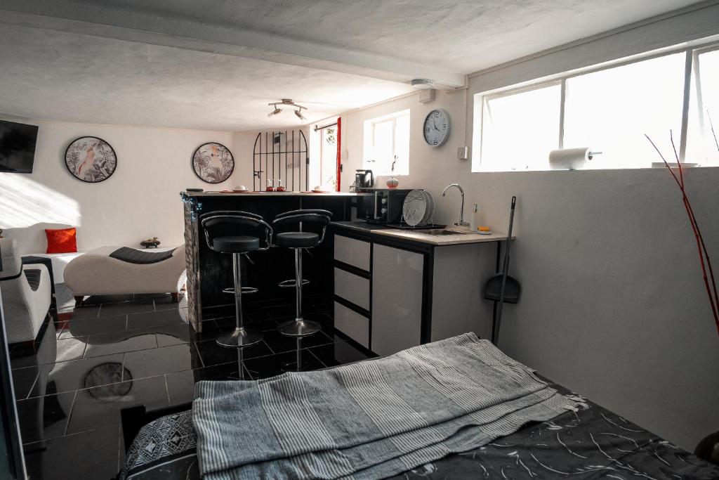 Kuchyň nebo kuchyňský kout v ubytování Studio B