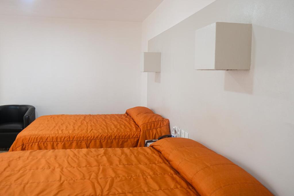 Postel nebo postele na pokoji v ubytování Hotel St. George
