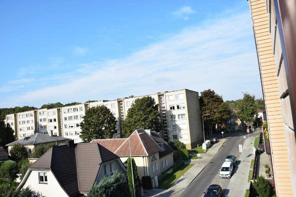 a view of a city street with a building at Provence apartment in Šiauliai