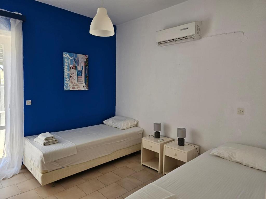 Postel nebo postele na pokoji v ubytování Corfu Dream Holidays Villas