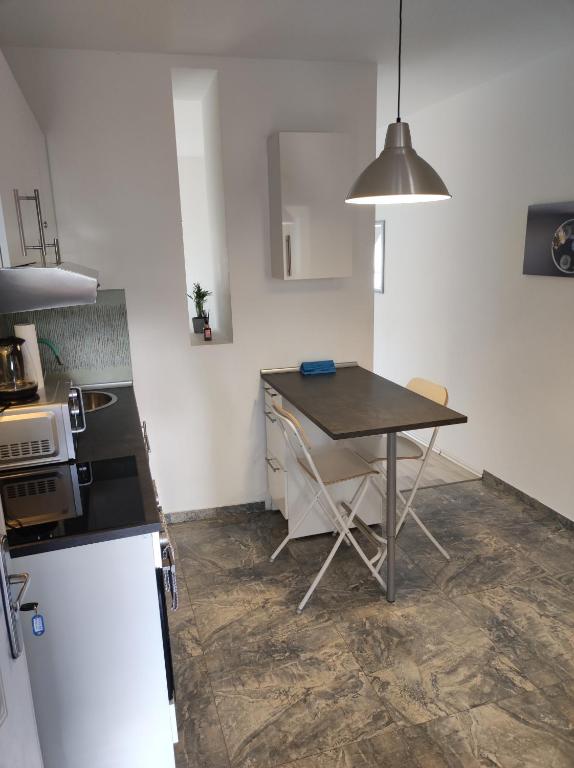 Kuchyňa alebo kuchynka v ubytovaní RYB Lofts - Modern Comfort by Downtown BP