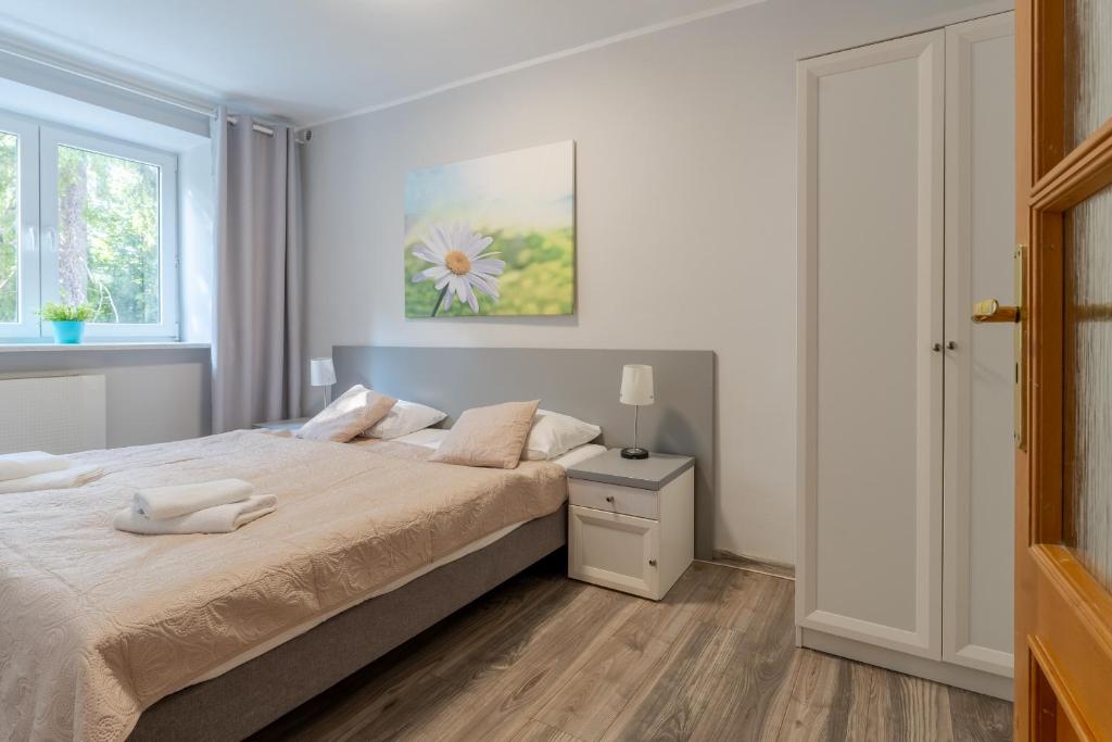 Posteľ alebo postele v izbe v ubytovaní Willa Sonata - Apartamenty & Balia - Szklarska Poręba