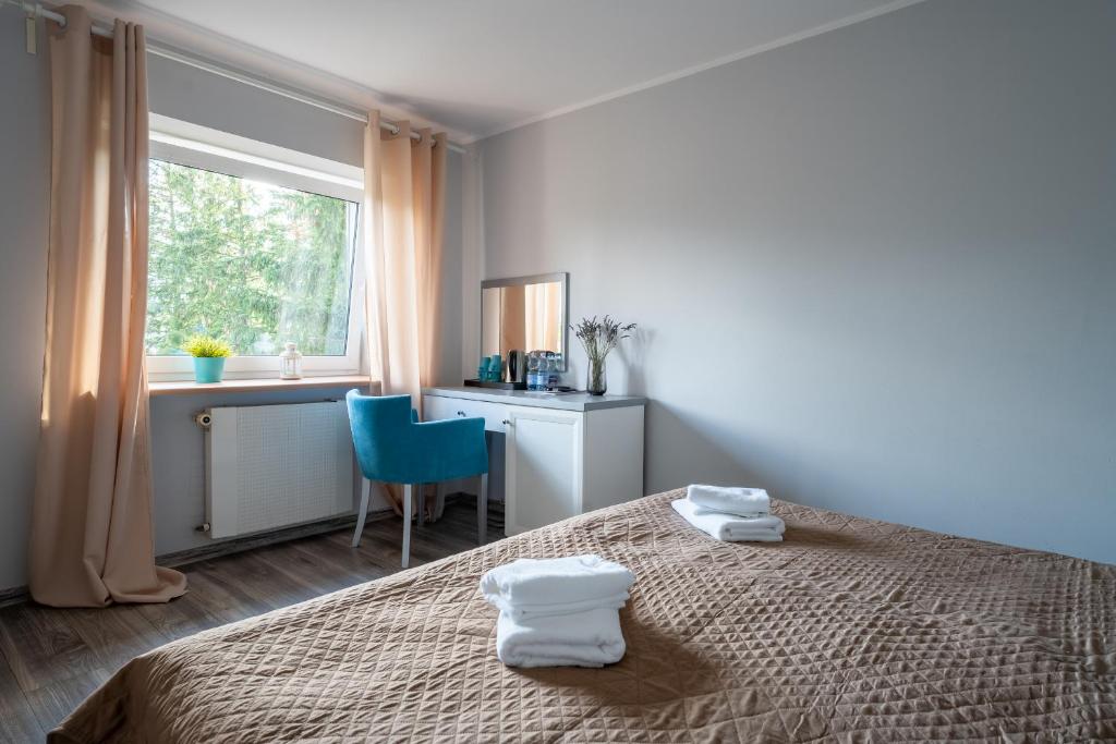 Posteľ alebo postele v izbe v ubytovaní Willa Sonata - Apartamenty & Balia - Szklarska Poręba