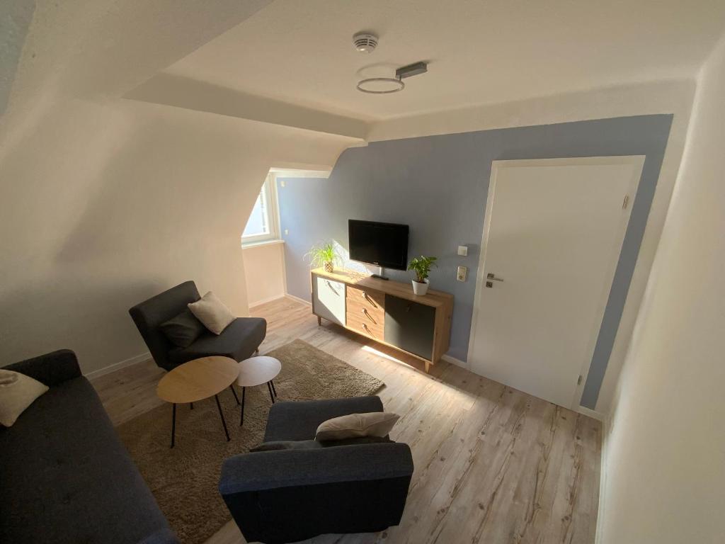 TV a/nebo společenská místnost v ubytování M.C. Apartment Erfurt Südpark