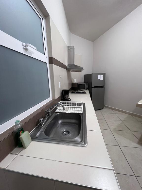 Kuchyň nebo kuchyňský kout v ubytování Privada 400