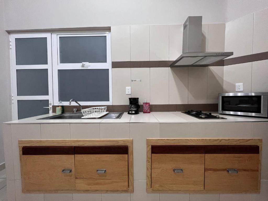 Kuchyň nebo kuchyňský kout v ubytování Privada 400