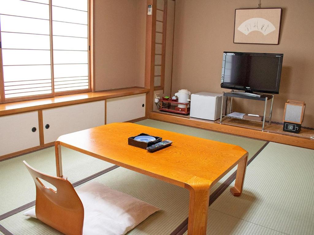 Televízia a/alebo spoločenská miestnosť v ubytovaní Hotel Akaboshitei - Vacation STAY 49519v