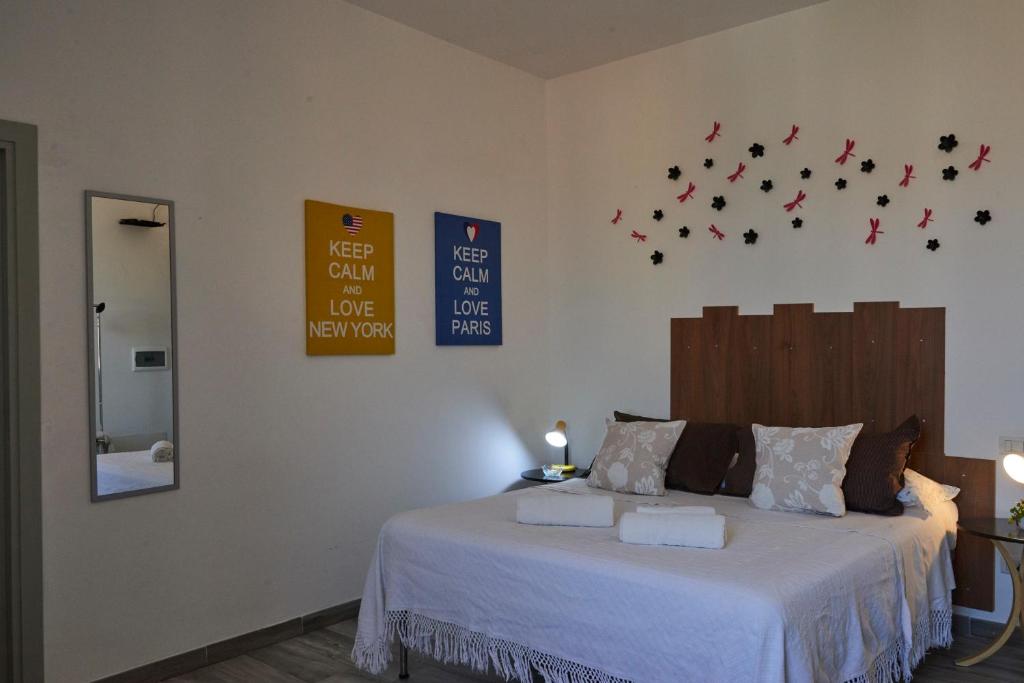 Postel nebo postele na pokoji v ubytování Jerry & Titty house