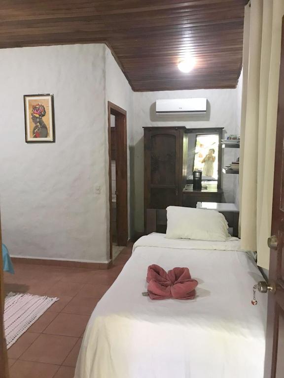 Postel nebo postele na pokoji v ubytování Casa Caribbean Coconut