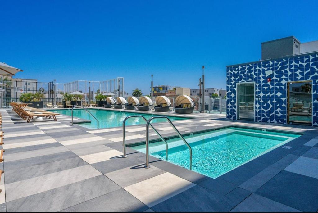 a swimming pool on top of a building at Level Long Beach - East Village in Long Beach