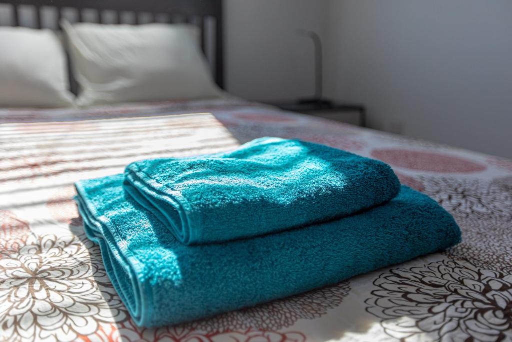 Postel nebo postele na pokoji v ubytování Cosy Apart at Lykavitos