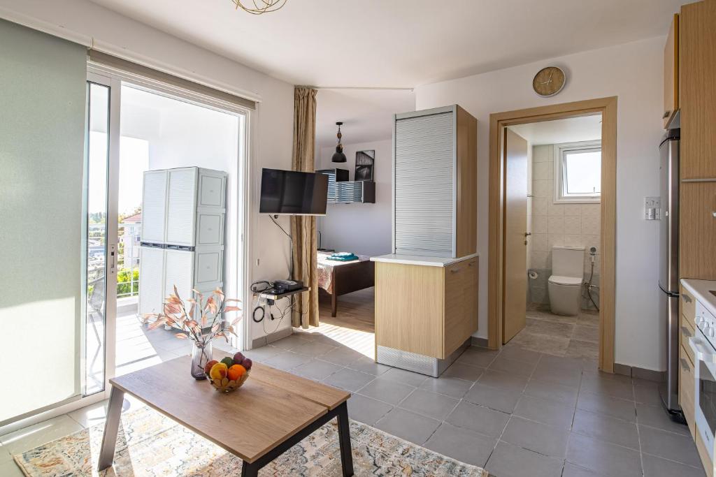 TV a/nebo společenská místnost v ubytování Cosy Apart at Lykavitos