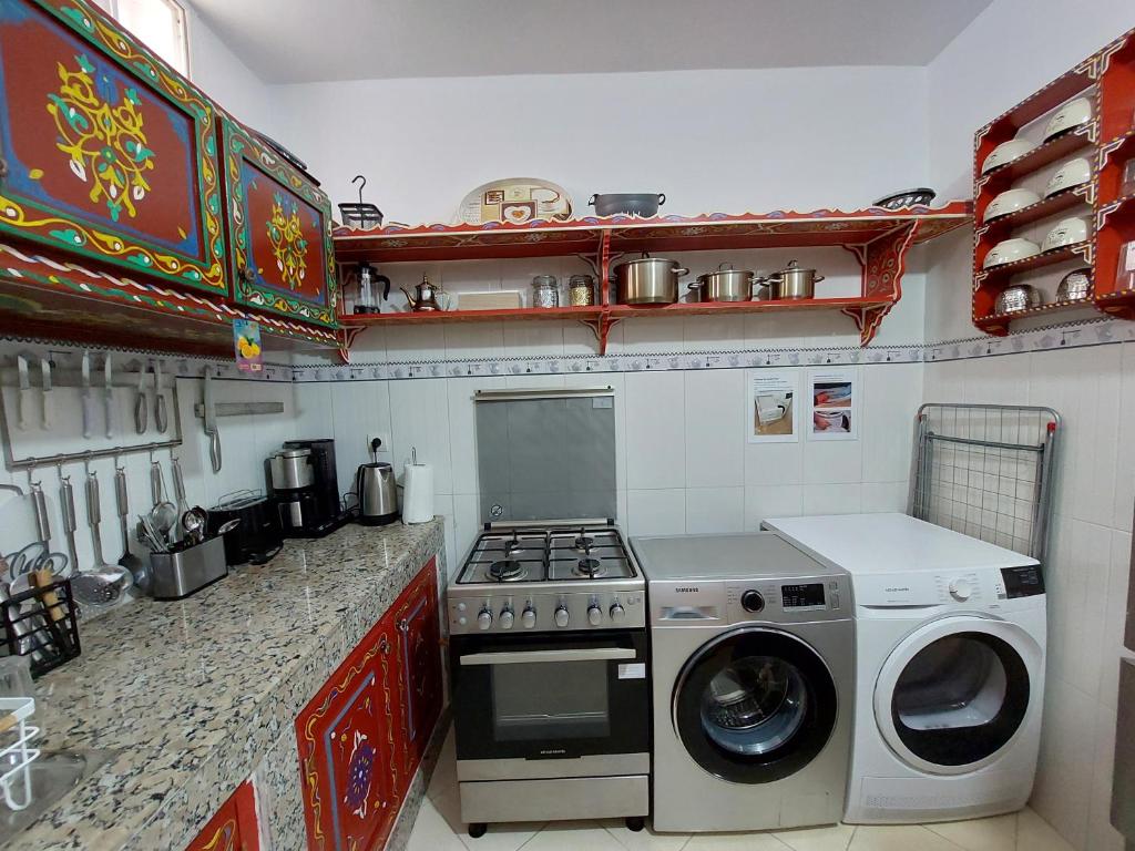 Een keuken of kitchenette bij Riad Maya